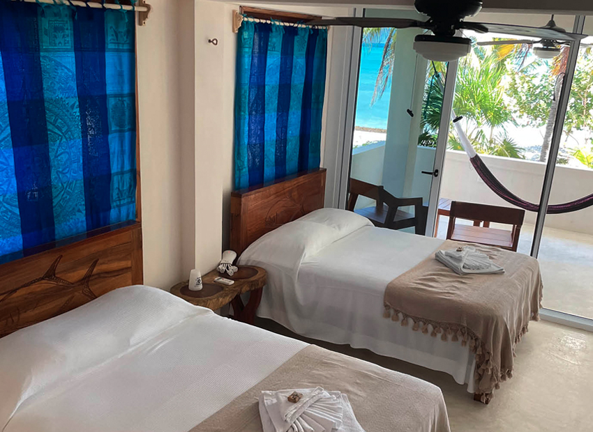 A double room accommodation with a balcony and hammock at the Kay Fly Fishing Lodge in Punta Allen, Mexico