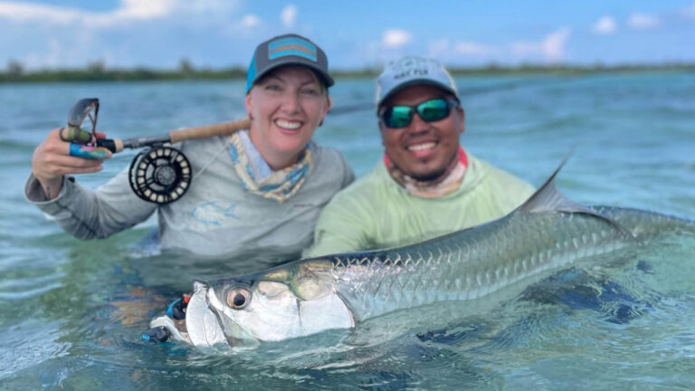 An inshore fly fishermen catches a tarpon in Ascension Bay, Mexico.