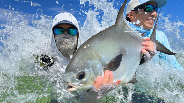 A guest of Kay Fly fishing catches a permit inshore fly fishing.